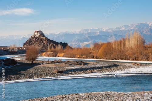 Stakna Monastery from opposite bank of river Indus photo