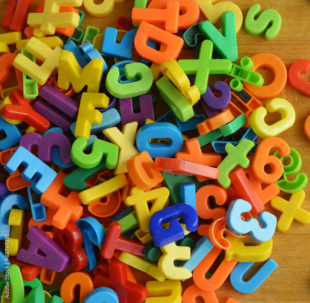 A pile of colorful letters and numbers A pile of colorful letters and numbers