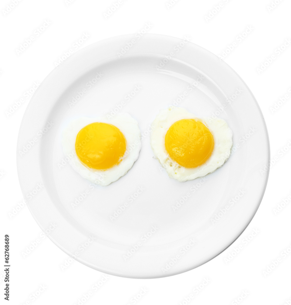 Scrambled eggs with bread on plate, on color napkin Scrambled eggs with bread on plate, on color napkin