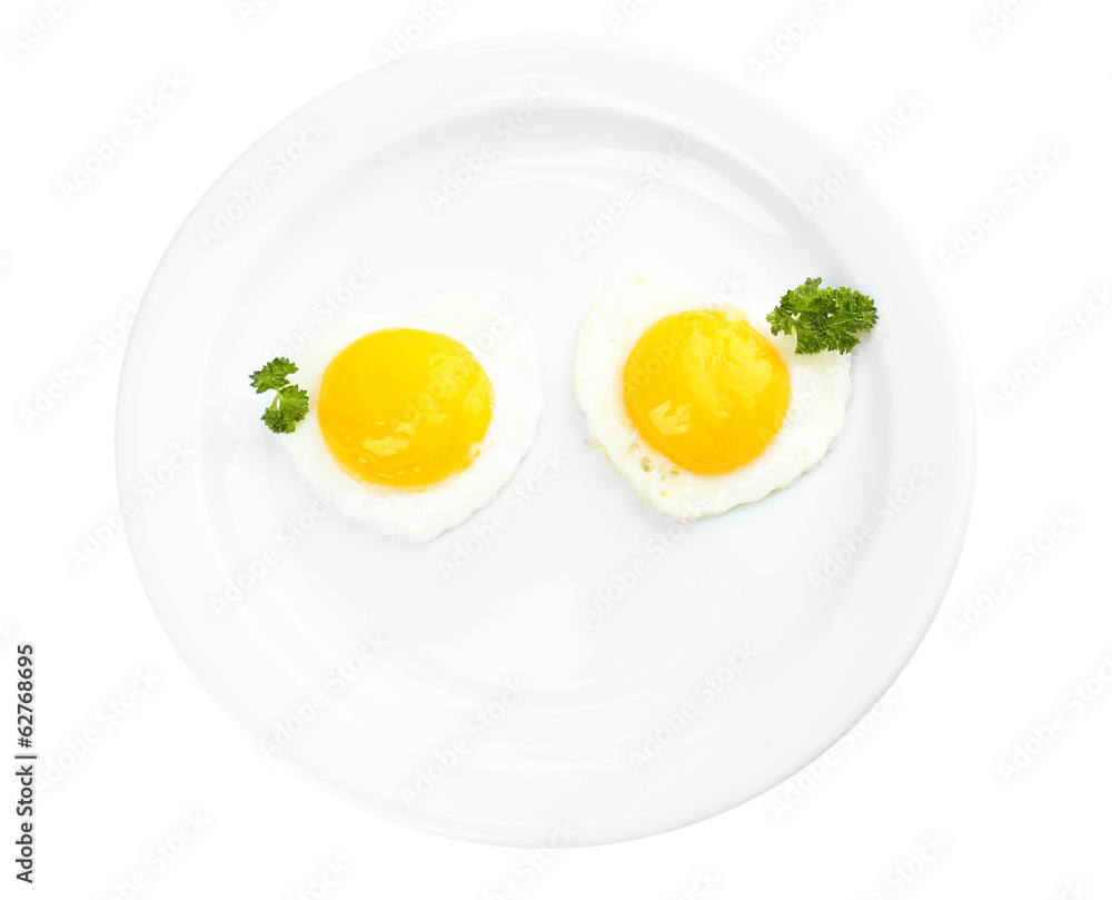 Scrambled eggs with bread on plate, on color napkin Scrambled eggs with bread on plate, on color napkin
