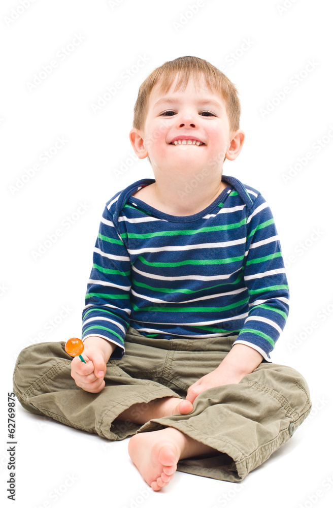 Portrait of laughing boy with candy in the hand Portrait of laughing boy with candy in the hand