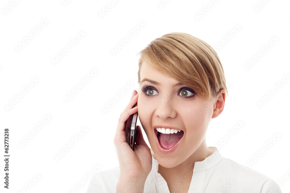 Closeup of surprised businesswoman talking on phone Closeup of surprised businesswoman talking on phone