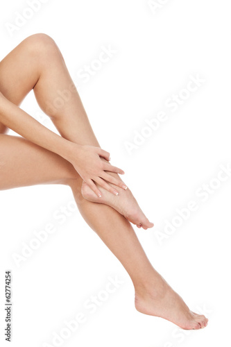 Beautiful woman legs, isolated on white © zavgsg