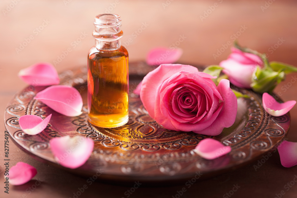 rose flower and essential oil. spa and aromatherapy