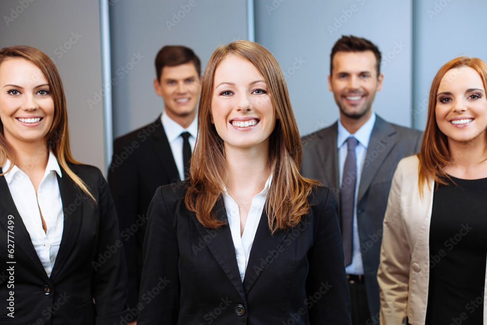 Group of business partners standing together Group of business partners standing together