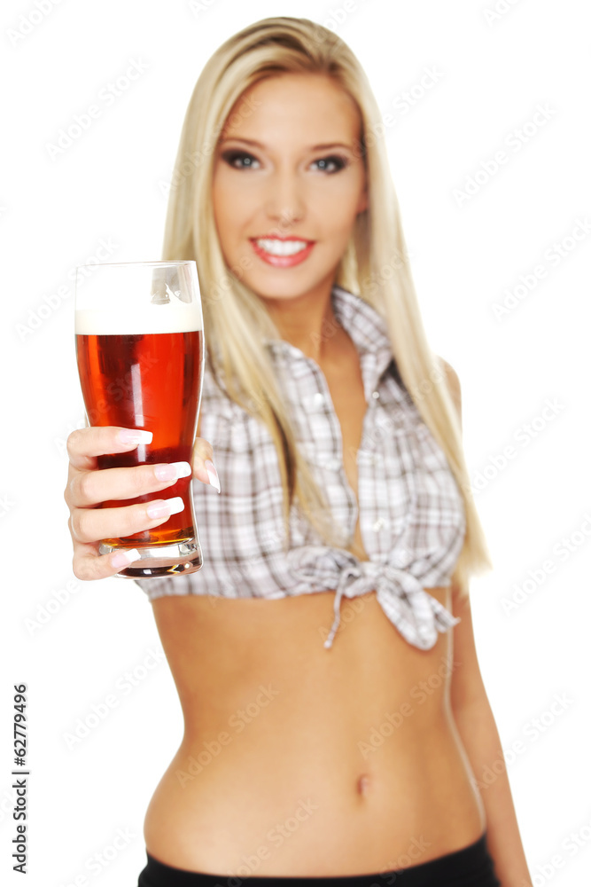 Beautiful and sexy woman holding glass of beer Beautiful and sexy woman holding glass of beer
