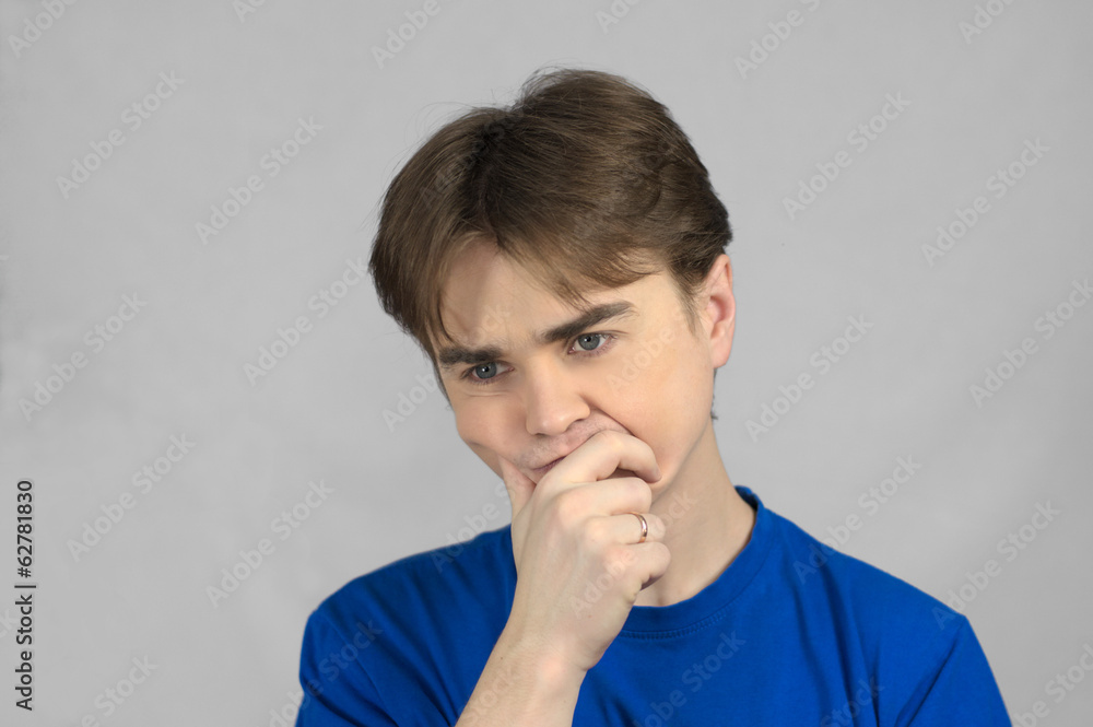 Thingking man leans on a palm Thingking man leans on a palm