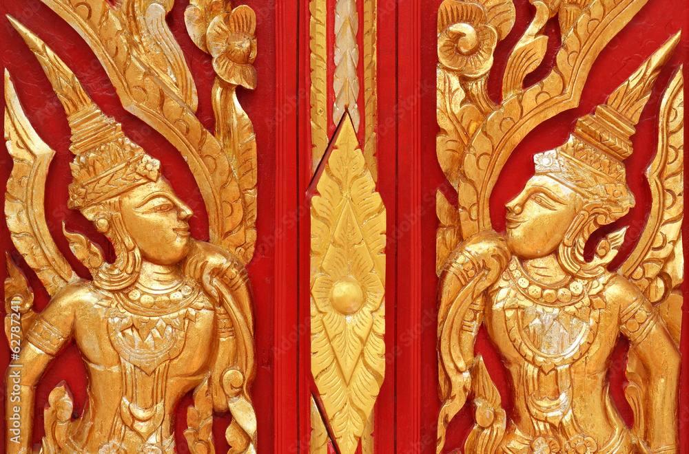 thai style golden carving art on the  door temple