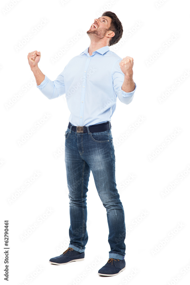 Man with hands clenched in fists in success Man with hands clenched in fists in success