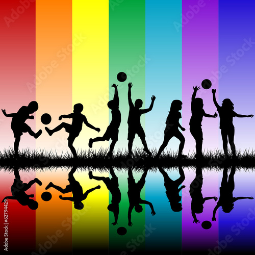 Children silhouettes playing on rainbow background