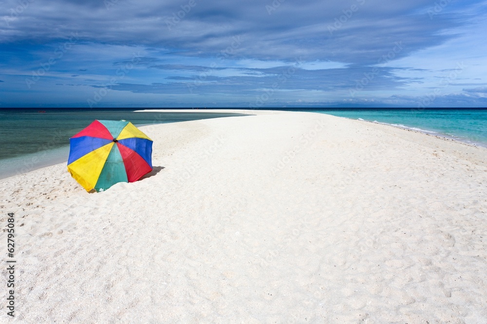 Sunshade on tropical white beach