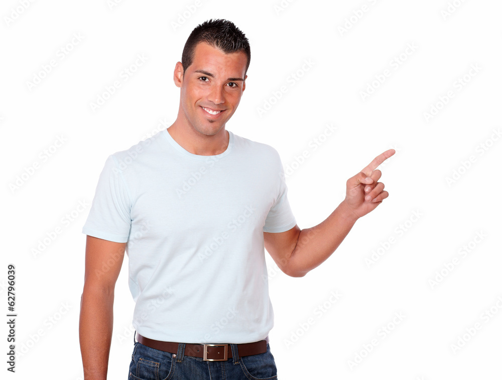 Gorgeous hispanic man pointing to his left Gorgeous hispanic man pointing to his left