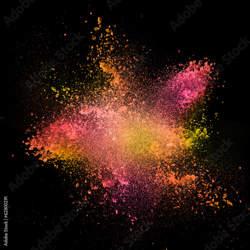 Colorful powders, on black background