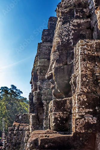Faces of ancient Bayon Temple At Angkor Wat