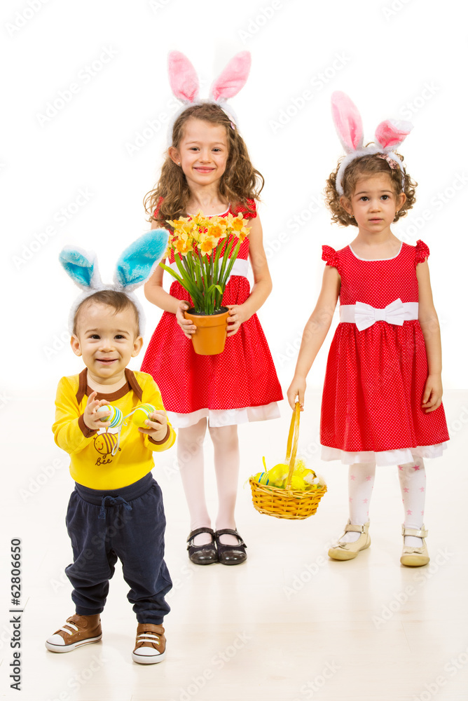 Happy three brothers with Easter eggs - obrazy, fototapety, plakaty 