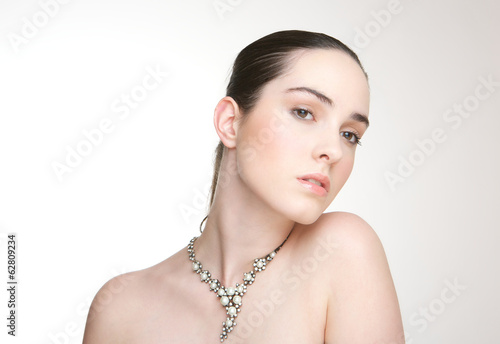 Female fashion model with necklace