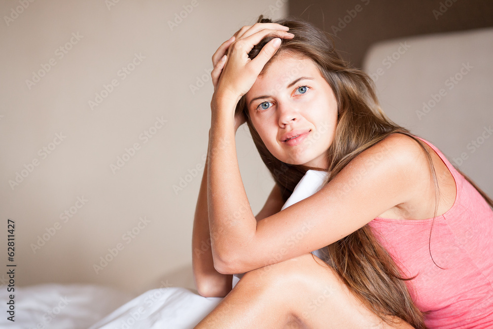 beautiful sleepy young long haired woman waking up in the beautiful sleepy young long haired woman waking up in the