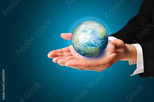 Male hand hold earth globe