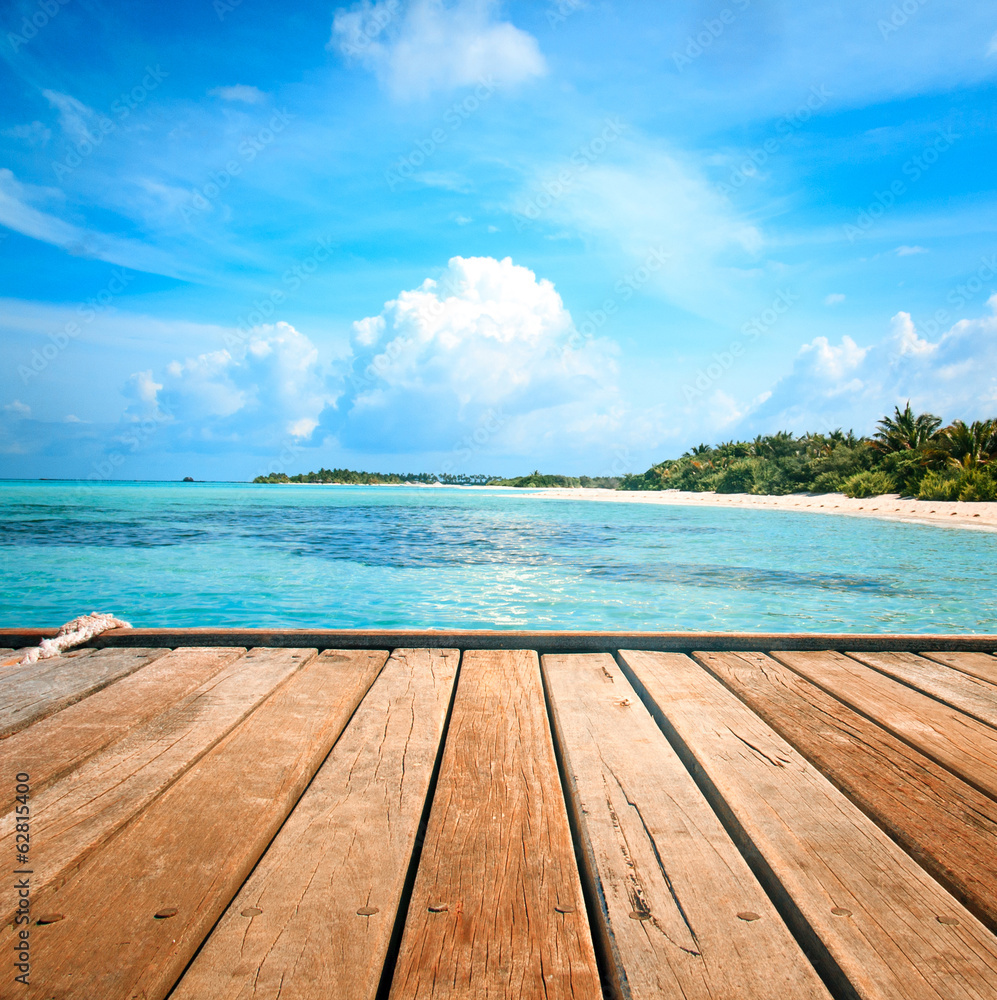 Fototapeta premium Jetty, beach and jungle - vacation background