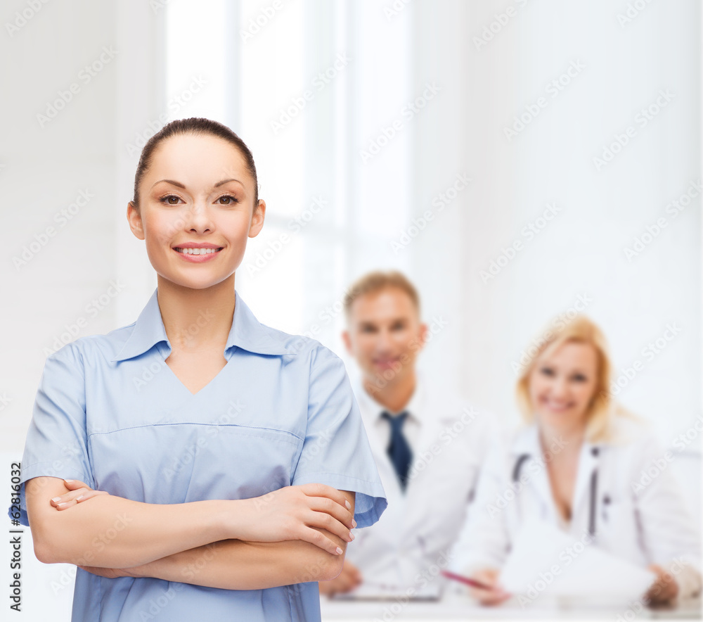 smiling female doctor or nurse smiling female doctor or nurse