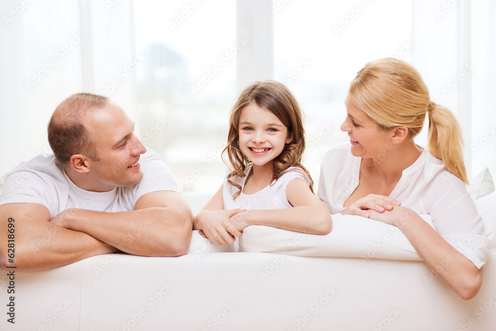 smiling parents and little girl at home smiling parents and little girl at home
