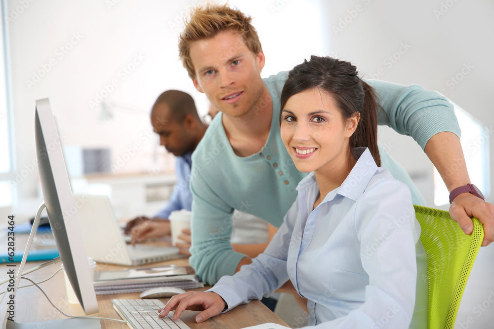 Group of young adults in business training Group of young adults in business training