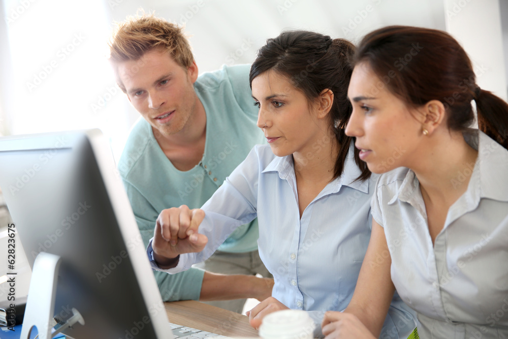 Group of young adults in business training Group of young adults in business training