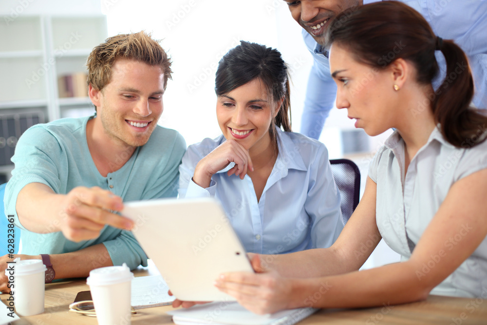Young business people meeting around table Young business people meeting around table