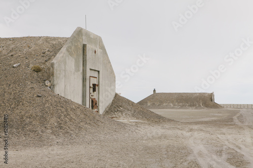 Abandoned munitions bunkers in desert