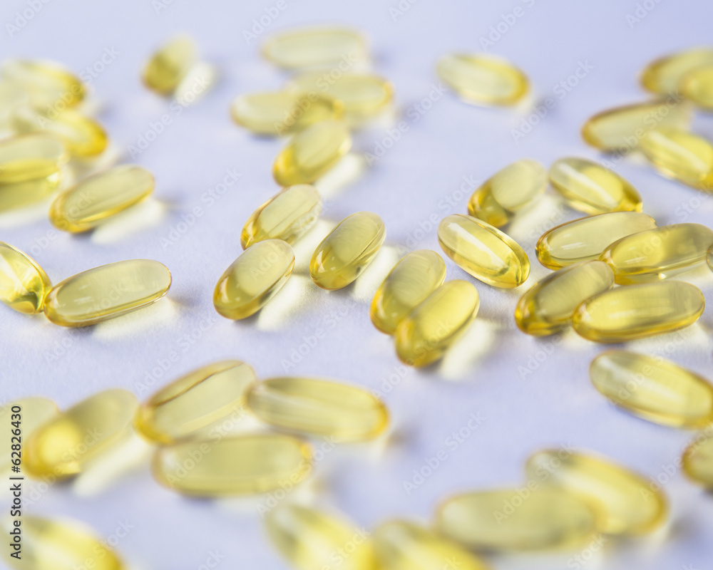 Fish oil providing Omega-3, in softgel supplement capsules. An essential fatty acid and health supplement product. Fish oil providing Omega-3, in softgel supplement capsules. An essential fatty acid and health supplement product.
