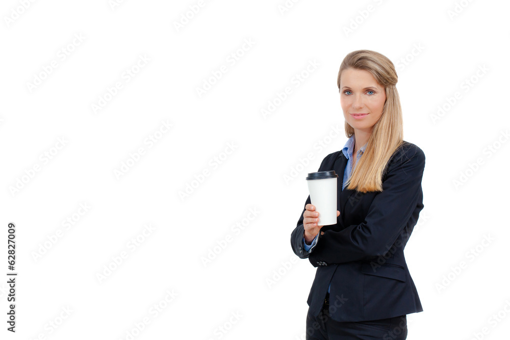 Beautiful blond young businesswoman holding a cup of coffee Beautiful blond young businesswoman holding a cup of coffee