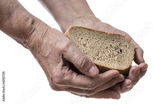 old hand with bread