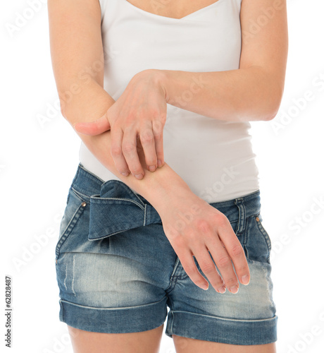 Young woman allergy scratching her arm