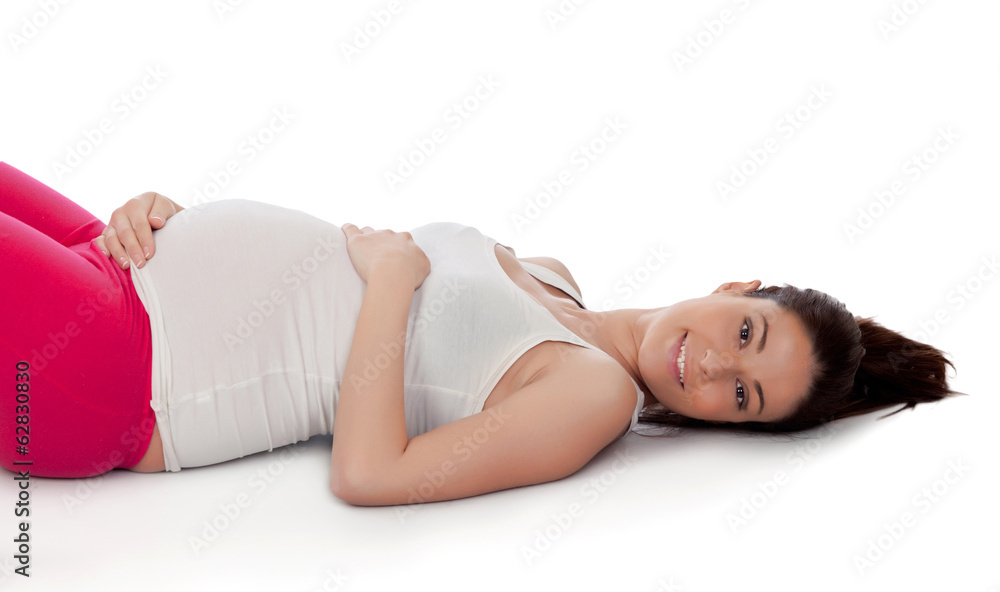 Pretty pregnant woman resting in her training Pretty pregnant woman resting in her training