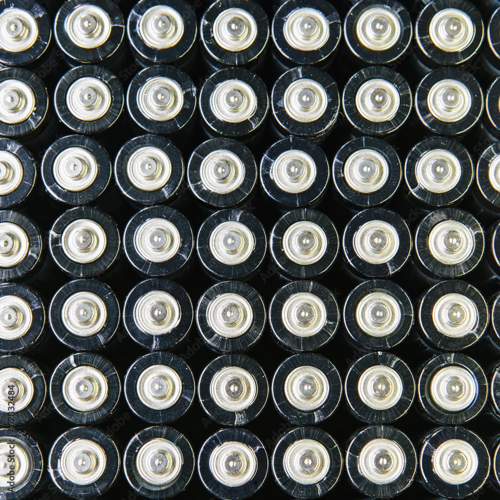 Rows of double A batteries, close up Rows of double A batteries, close up