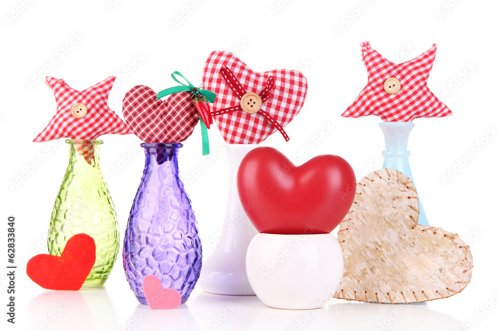 Hand-made textile hearts in different vases, isolated on white Hand-made textile hearts in different vases, isolated on white