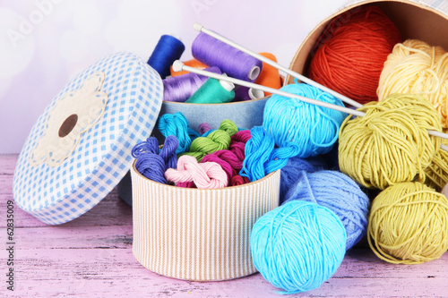 Decorative boxes with colorful skeins of thread
