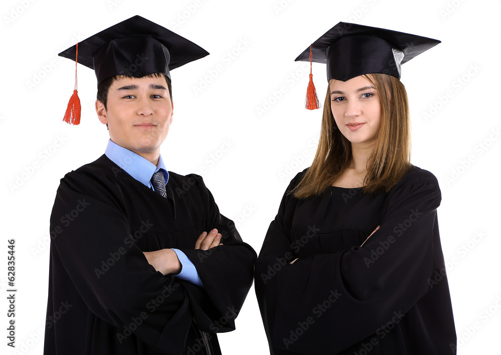 Two happy graduating students isolated on white