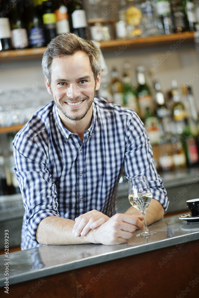 young bartender at his workplace young bartender at his workplace