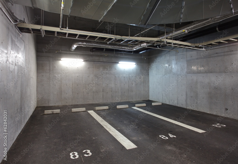 Parking garage underground interior, neon lights in dark - obrazy, fototapety, plakaty 