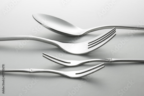 Metal spoon and forks.