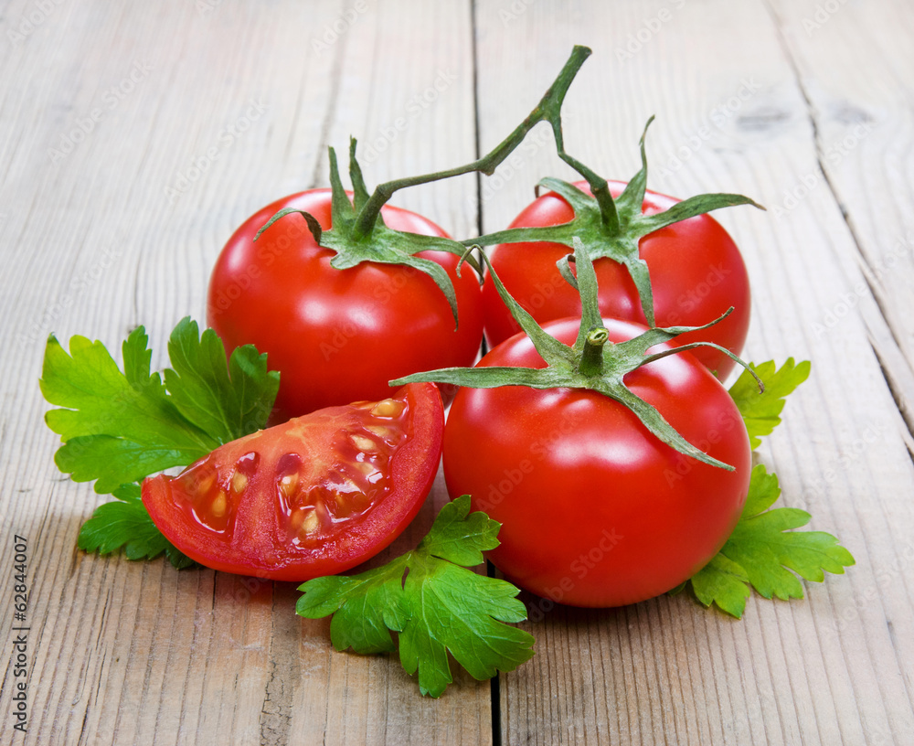 Ripe tomatoes with parsley Ripe tomatoes with parsley