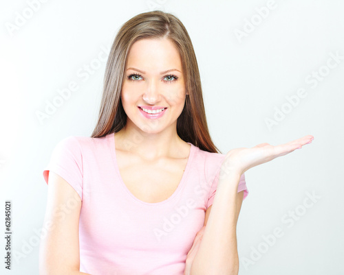 Wallpaper Mural Young casual woman style isolated over white background. Torontodigital.ca