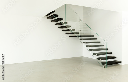 Interior, modern staircase in empty house.