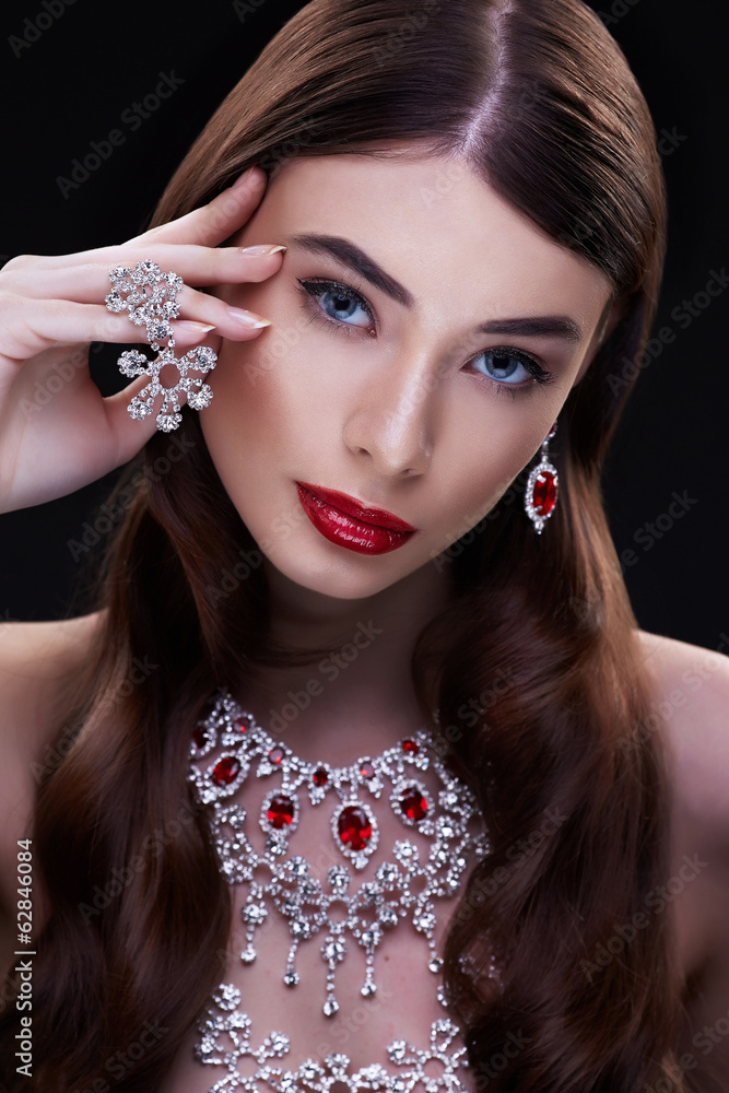 high fashion portrait of beautiful brunette woman wearing jewell