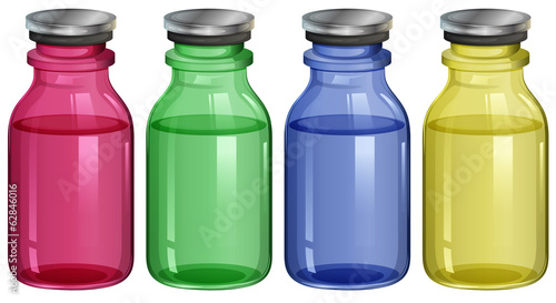 Four clear bottles