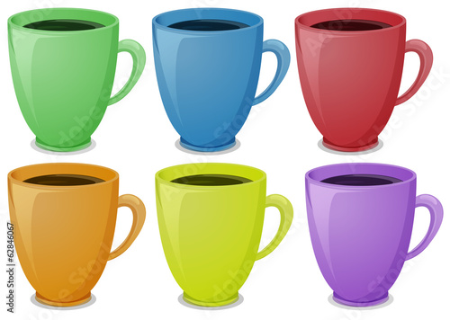 Colorful mugs with coffee