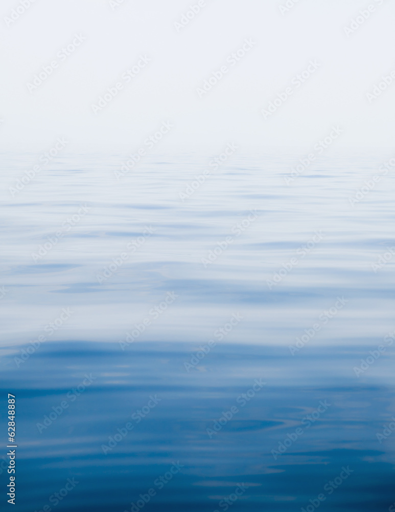 A view across the water surface of a lake near McBride Glacier, in Glacier Bay national park. A view across the water surface of a lake near McBride Glacier, in Glacier Bay national park.