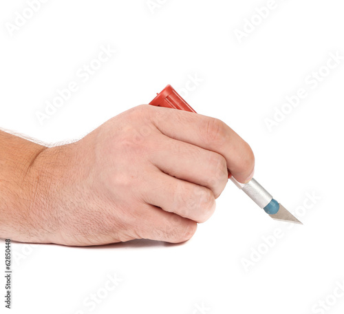 Hand holding a cutter knife