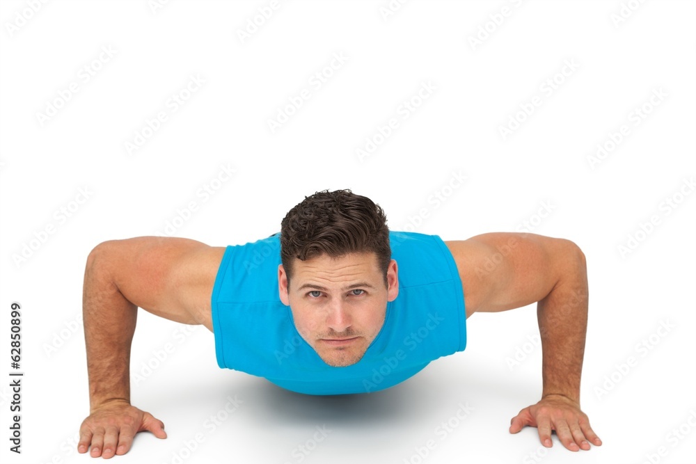 Portrait of a determined man doing push ups